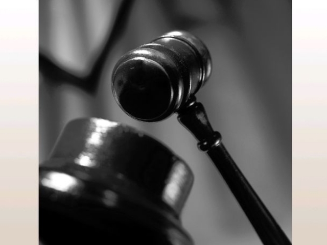 Man with KKK robe had unregistered machine gun, prosecutors say