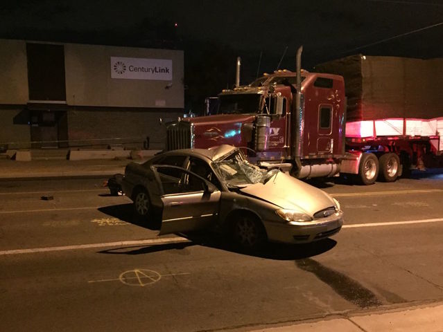 Firefighters: Two hurt after car crashes with semi in Phoenix