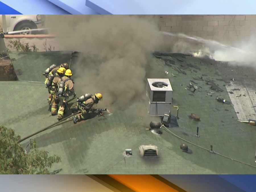 Firefighters battle first-alarm house fire in Tempe with downed power ...