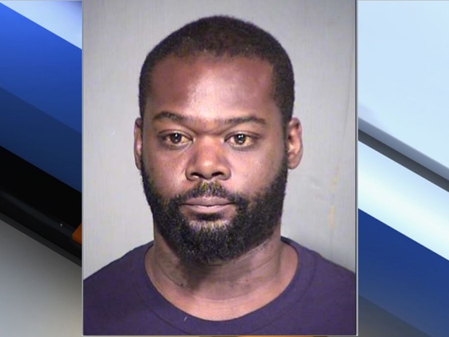 Police: Phoenix father arrested after holding knife to child's throat