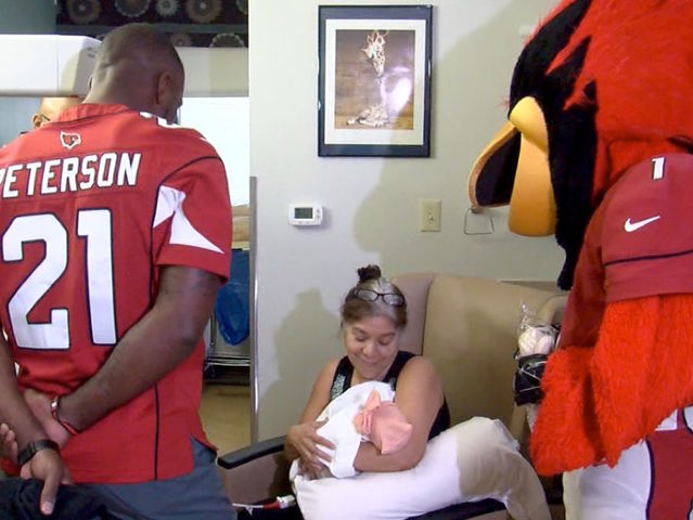 Arizona Cardinals player Patrick Peterson visits families in the NICU