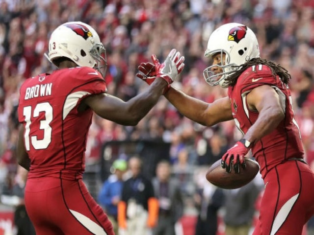 Larry Fitzgerald says his 1st-ever completed pass made his teammate $500,000 richer
