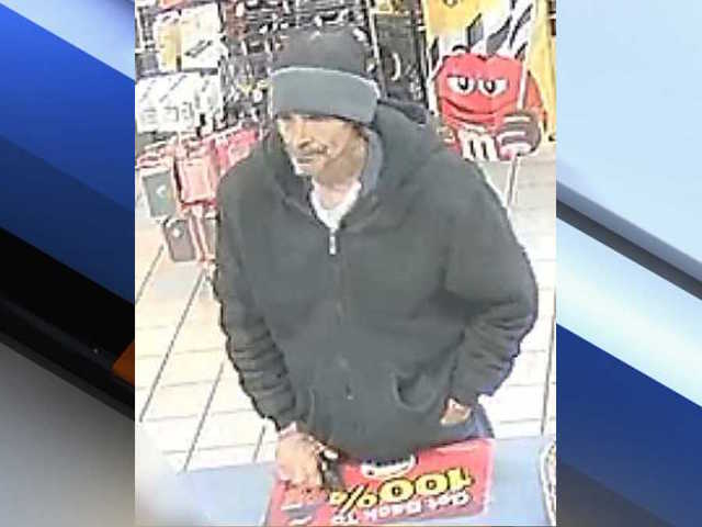 Man sought for holding Phoenix gas station clerk at gunpoint