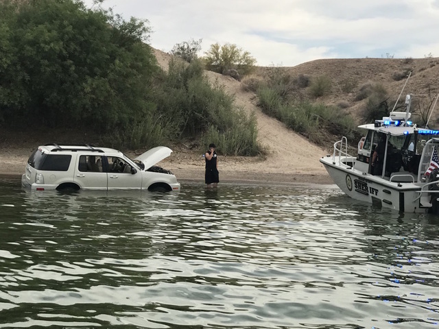 Men drive car into Lake Havasu while making bet; officials remove disabled car from water