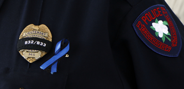 Band halftime show stirs anger, depicts police at gunpoint